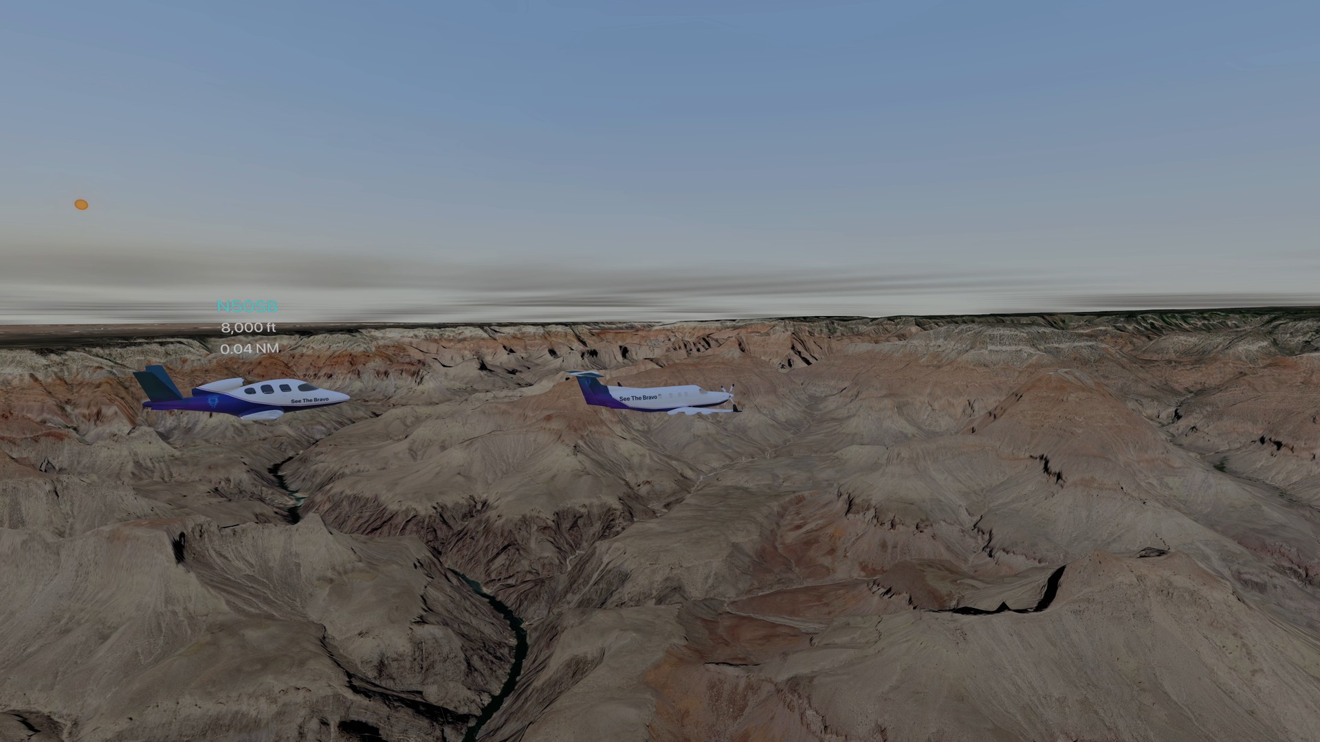 Two aircraft in echelon over the Grand Canyon in evening light